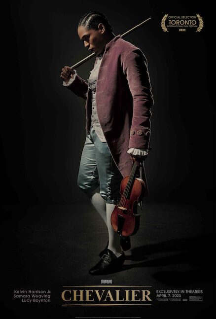 Young black man with violin in historic garb